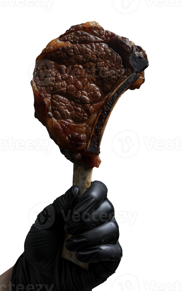 Hand wearing a black glove holding a grilled tomahawk steak on a transparent background png