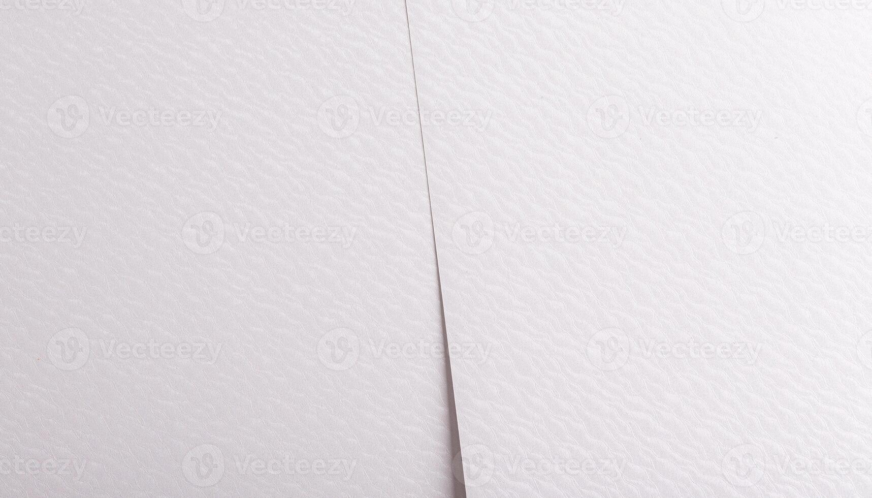 White paper texture with a soft, smooth surface and subtle wavy patterns. The clean, neutral design photo