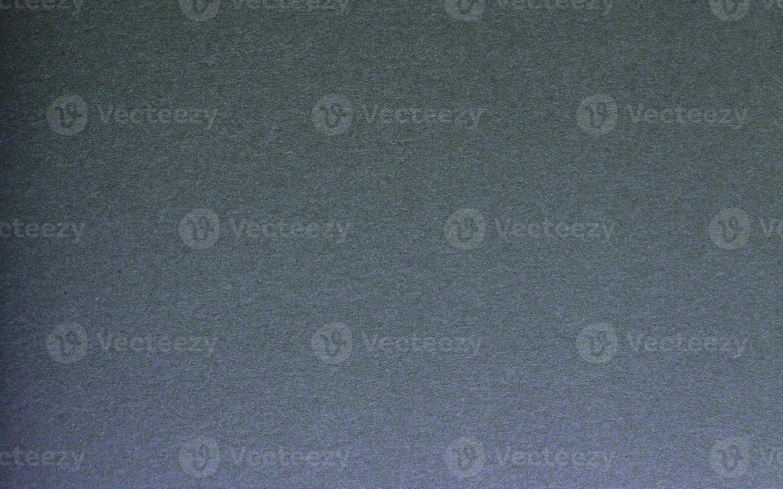 Gray-green paper texture with a subtle grainy finish and metallic sheen. The sleek, satin surface photo