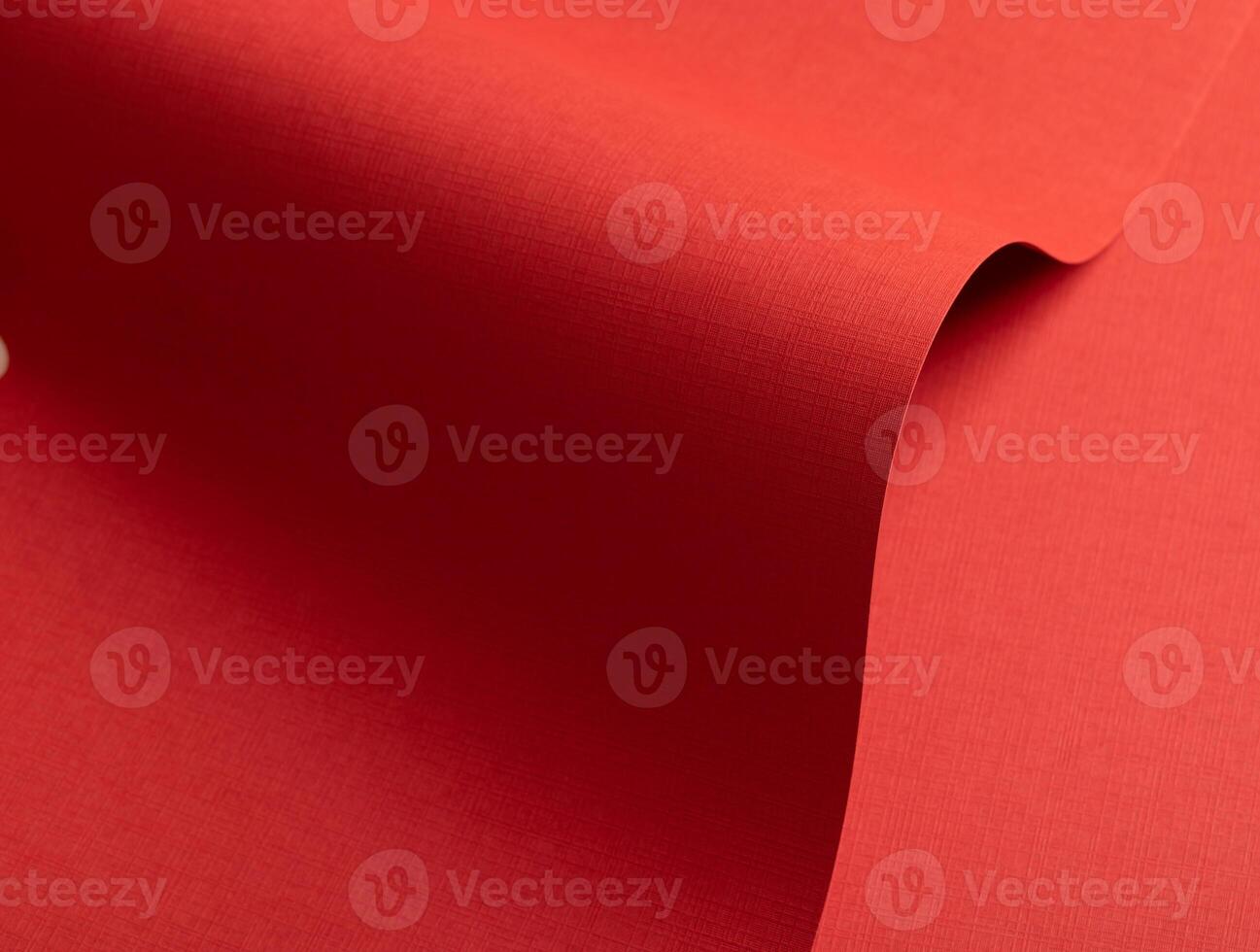Rich ruby red paper texture with a crosshatch pattern and fine embossed details. The vibrant surface photo