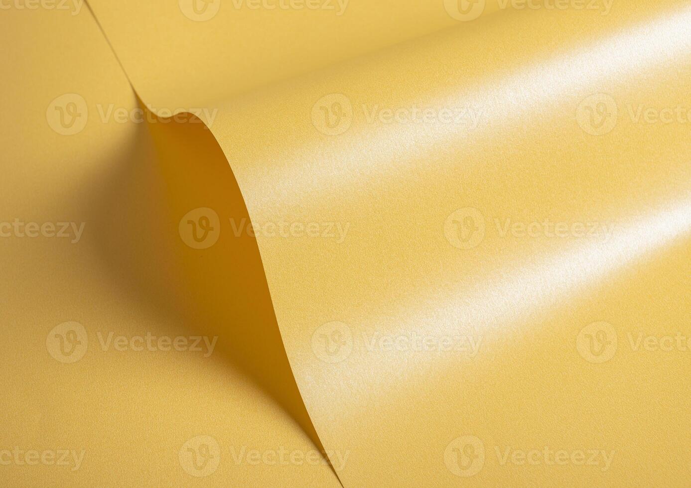 Pale gold paper texture with a glossy satin finish and a subtle gradient of creamy yellow tones. The photo