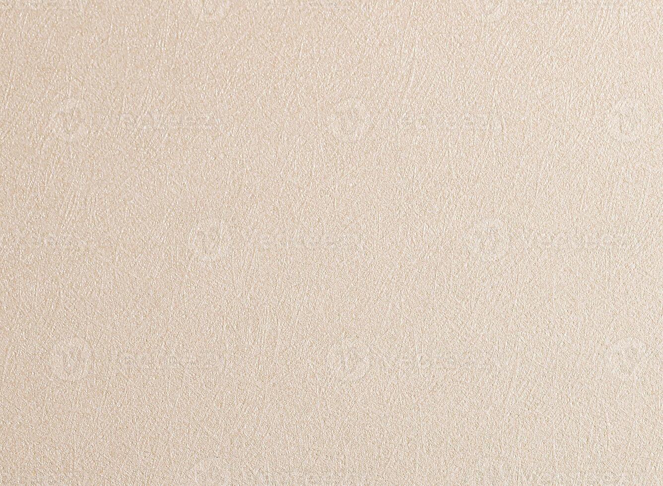 Ivory beige paper texture with a soft, fibrous surface and subtle satin sheen. The warm neutral photo