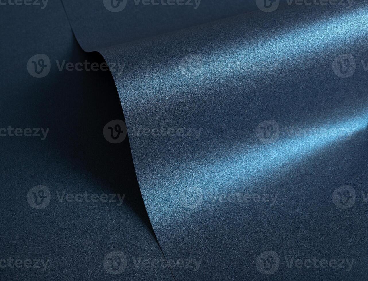 Dark blue paper texture with deep midnight blue. The sleek, glossy finish with subtle grain and photo