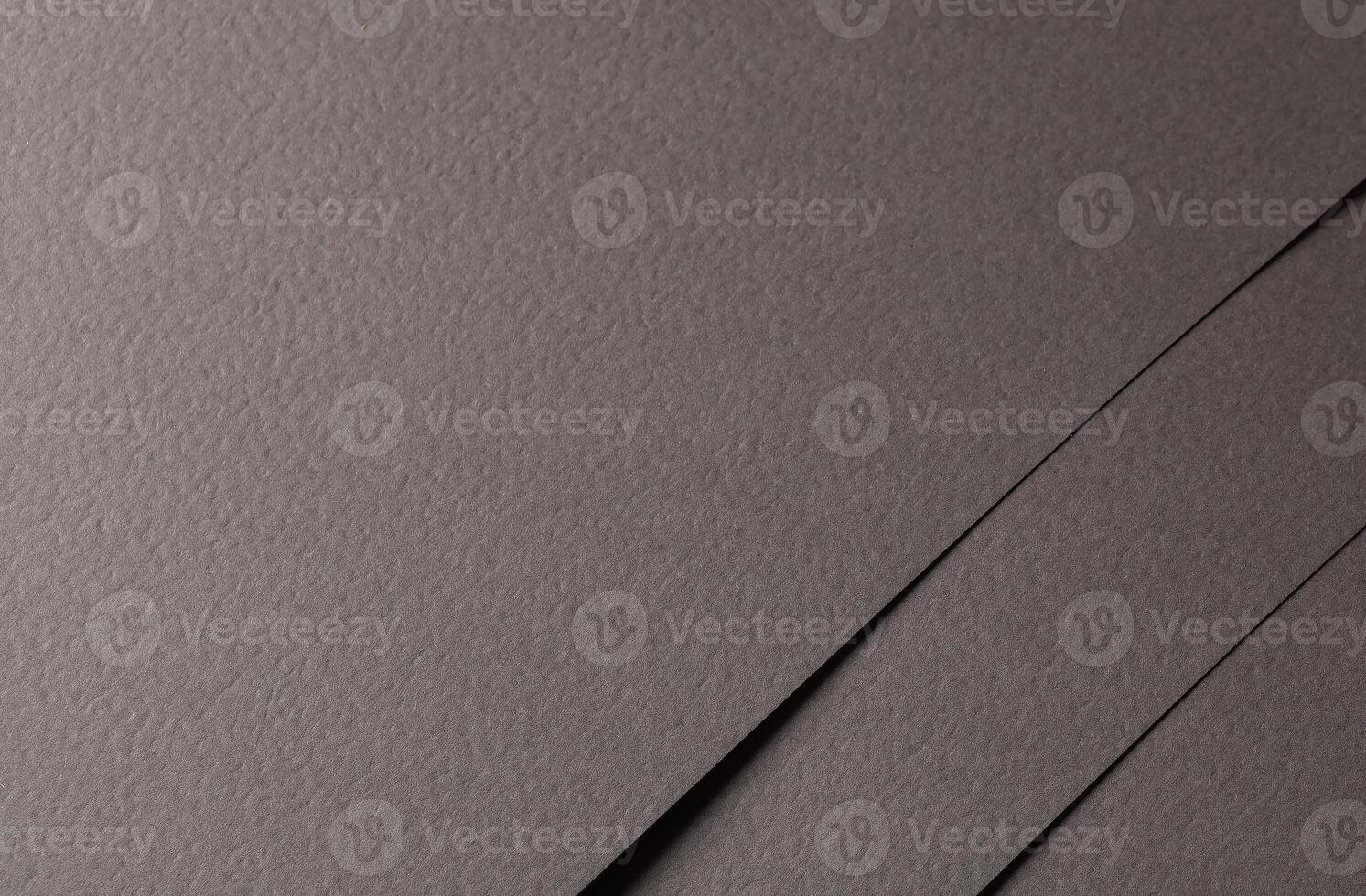 Leather like paper texture in deep taupe and brown tones with a matte, grainy finish. This natural, photo