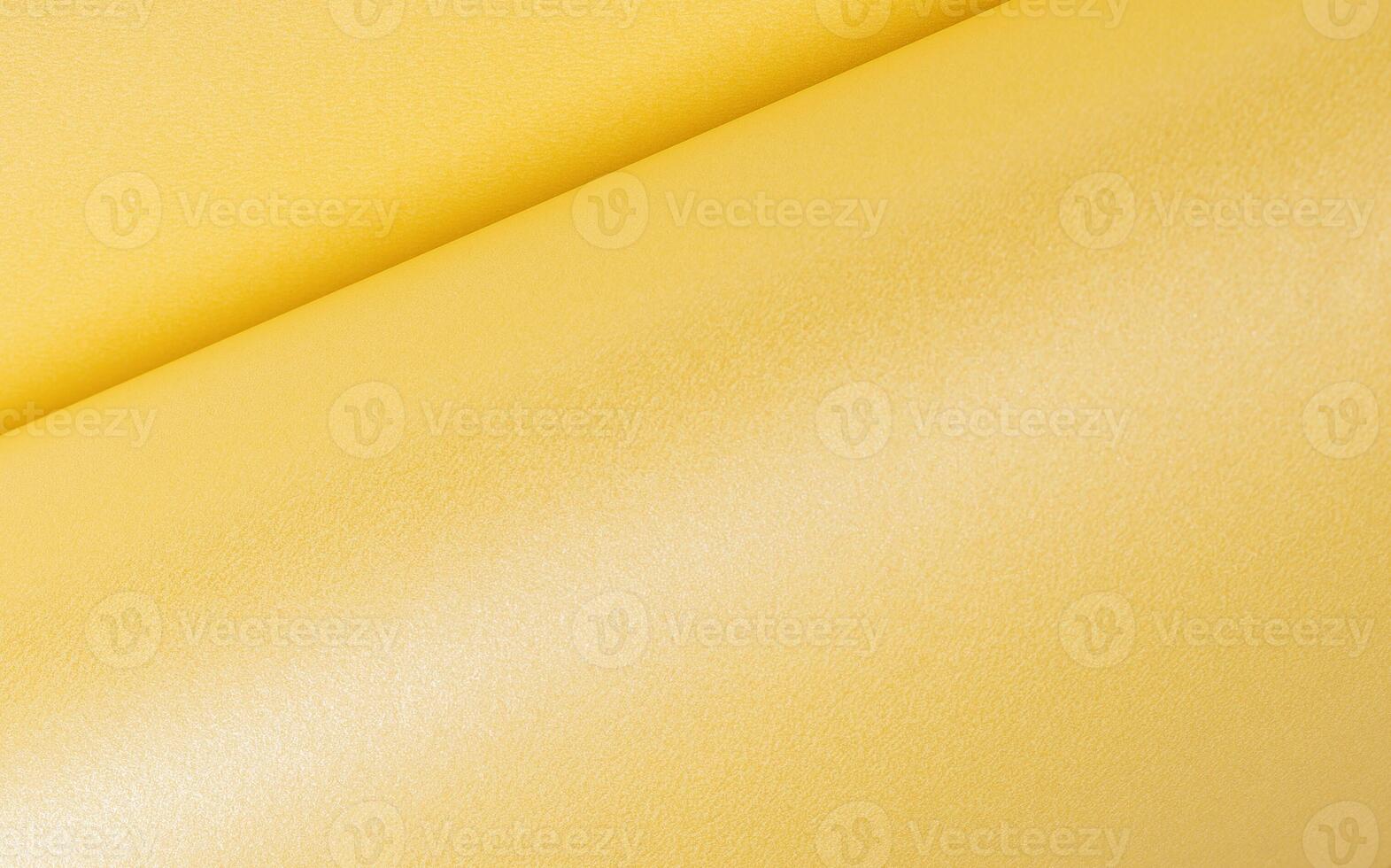 Pale gold paper texture with a soft, creamy yellow finish and subtle amber highlights. The glossy, photo