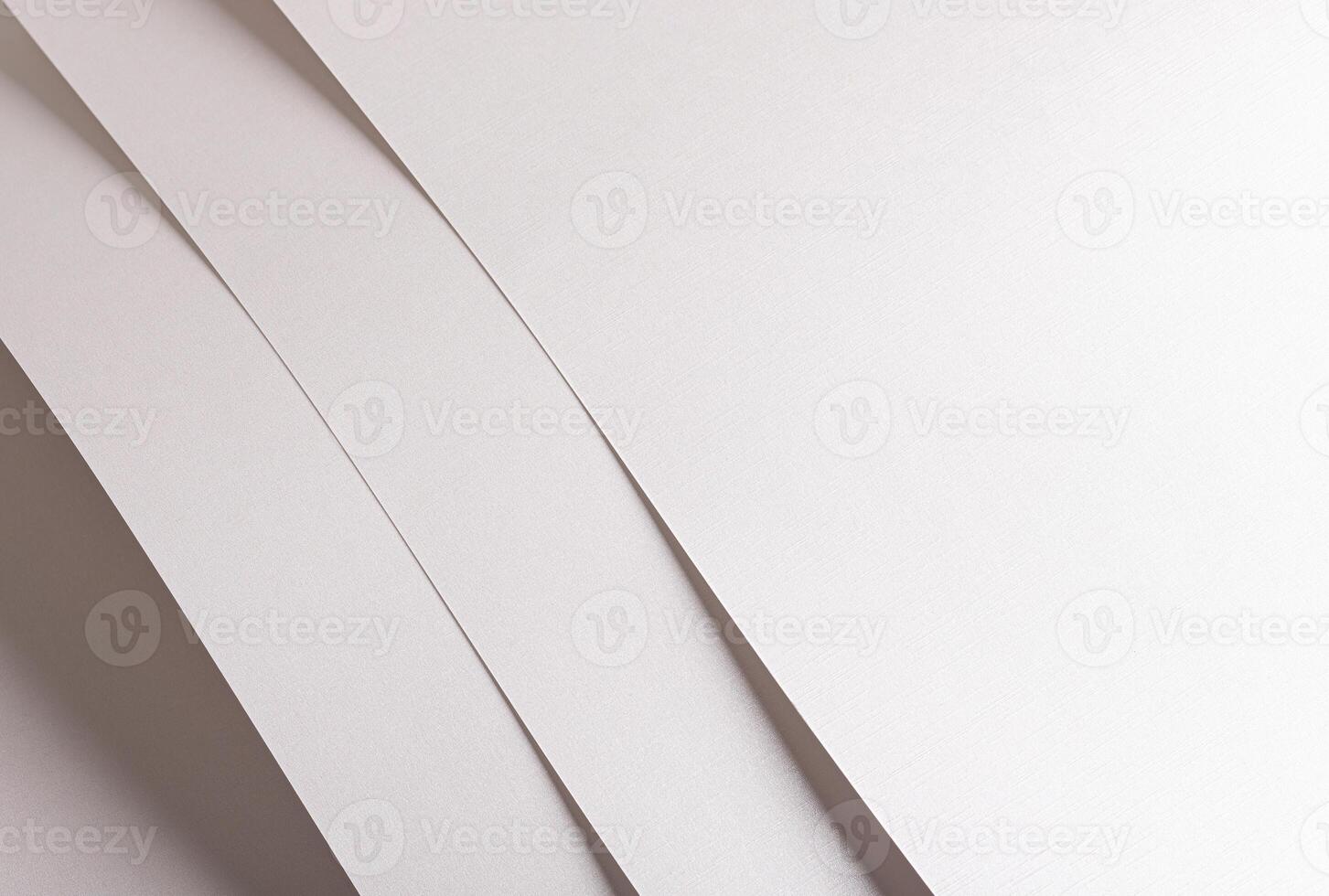 White paper texture with a soft satin finish and delicate fabric-like details. The subtle gradient photo