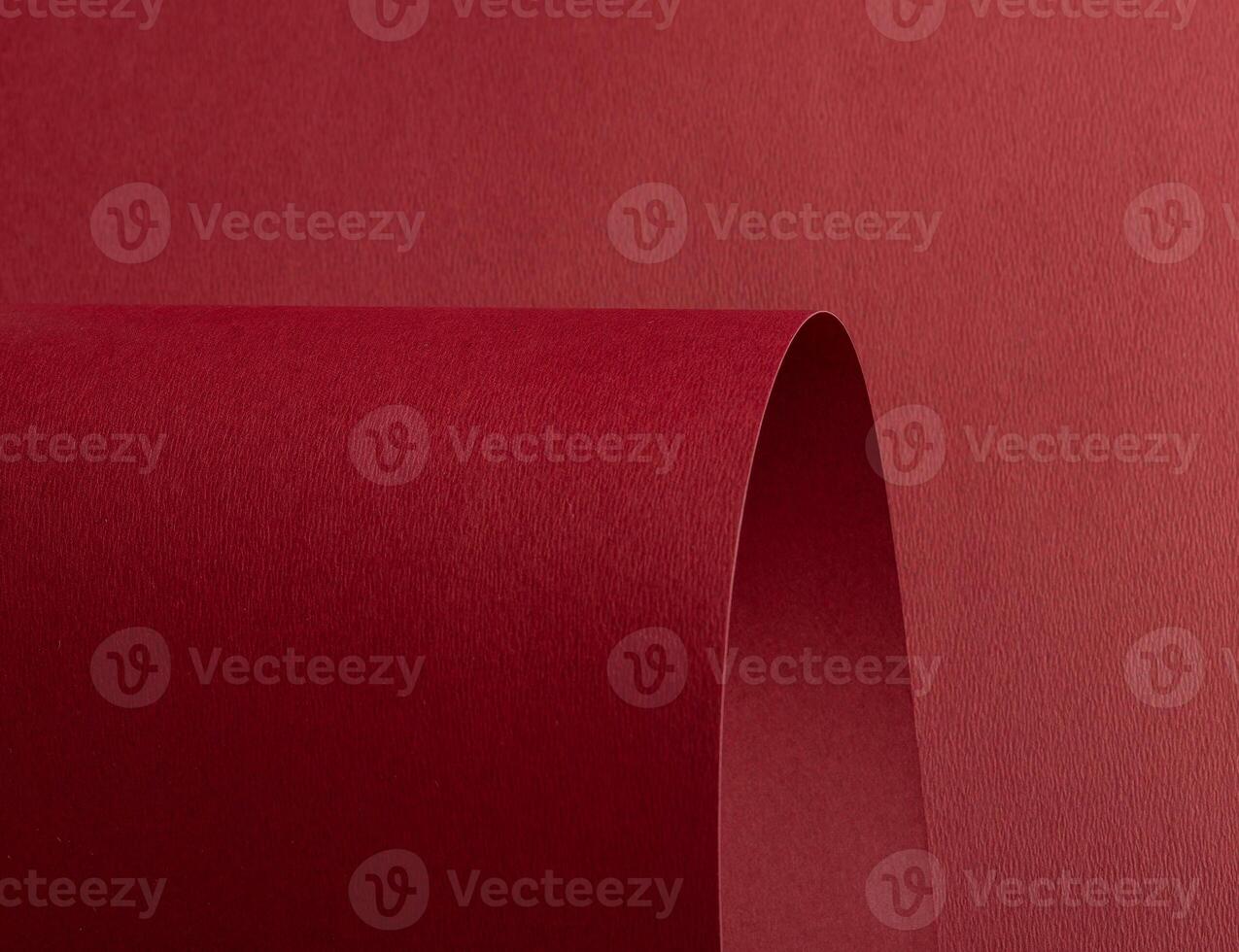Red paper texture with a matte woven finish. This deep, warm red design offers a luxurious and photo