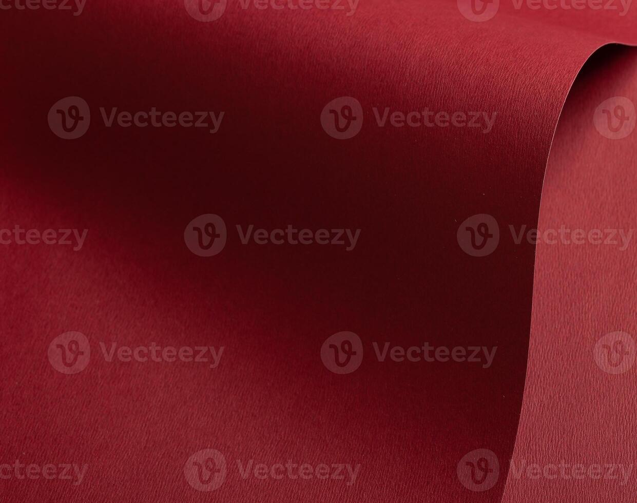 Chili pepper red paper texture with a wavy gradient and woven matte finish. This deep, warm red photo