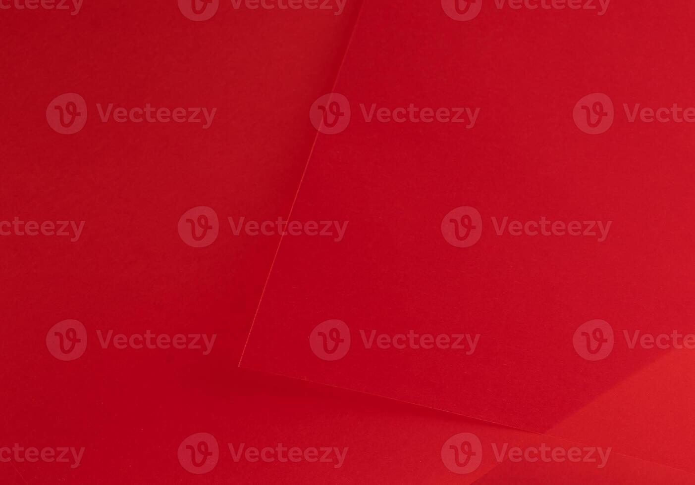Scarlet red paper background with a rich, vibrant gradient and smooth texture. Premium material with photo