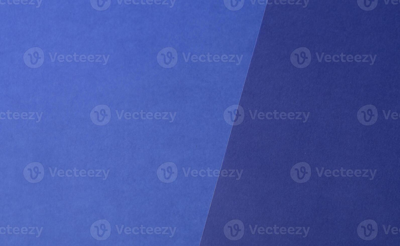 Royal blue tracing paper background with a matte finish and soft gradient. The translucent, grainy photo