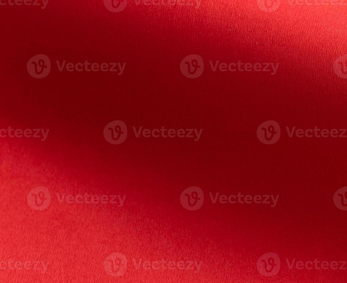 Crimson red paper texture with a soft matte finish and subtle gradients. The warm, vibrant tones and photo