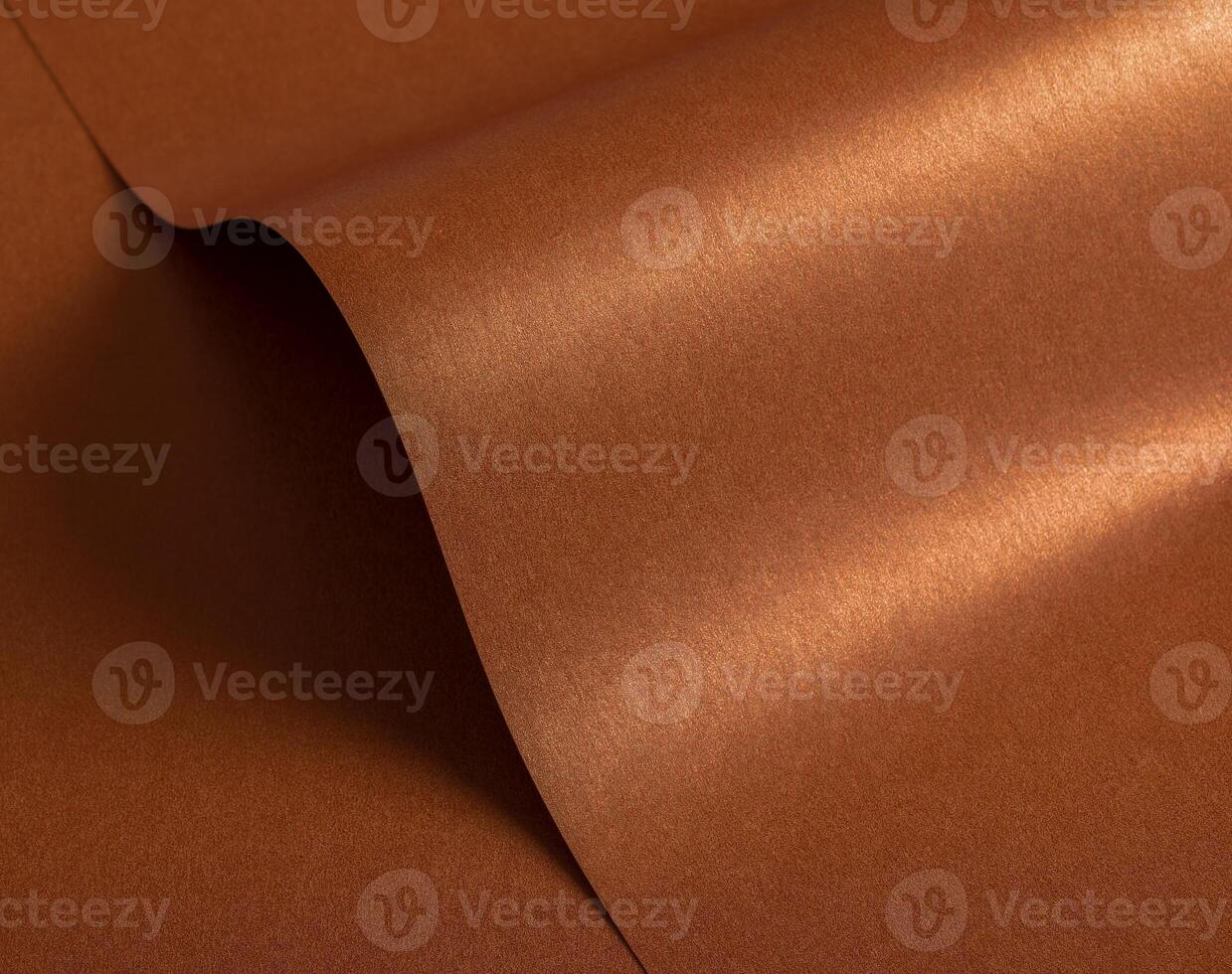 Copper and rust paper texture with a glossy metallic finish and subtle wavy patterns. The warm photo