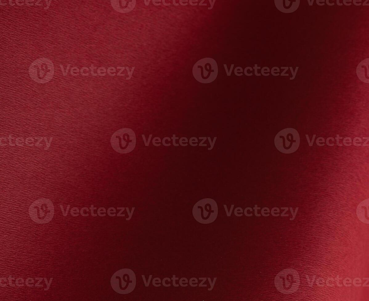 Red paper texture with a subtle gradient and matte woven finish. This deep, warm red material photo