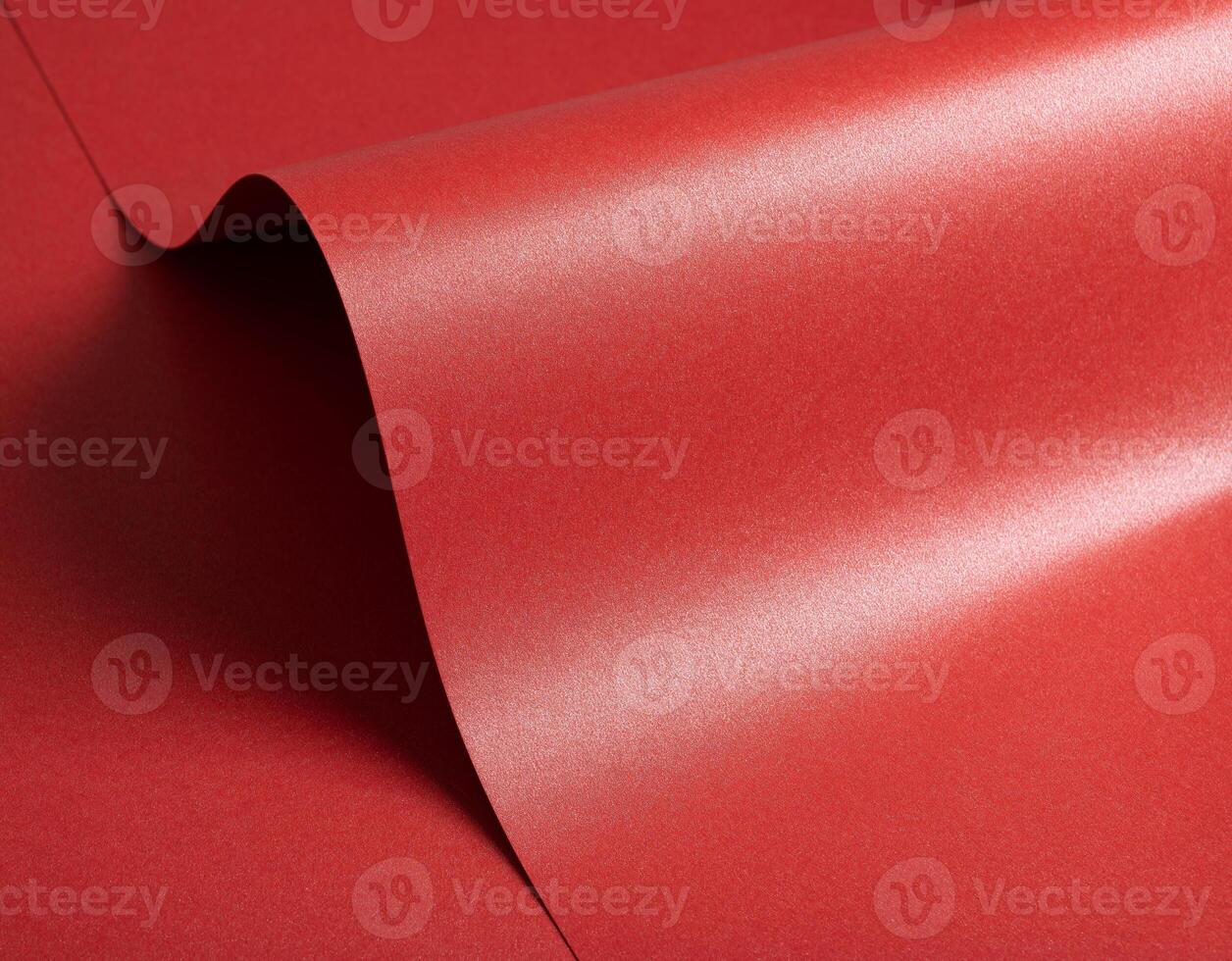 Luxurious red paper background with a vibrant ruby tone and glossy satin finish. Smooth and photo