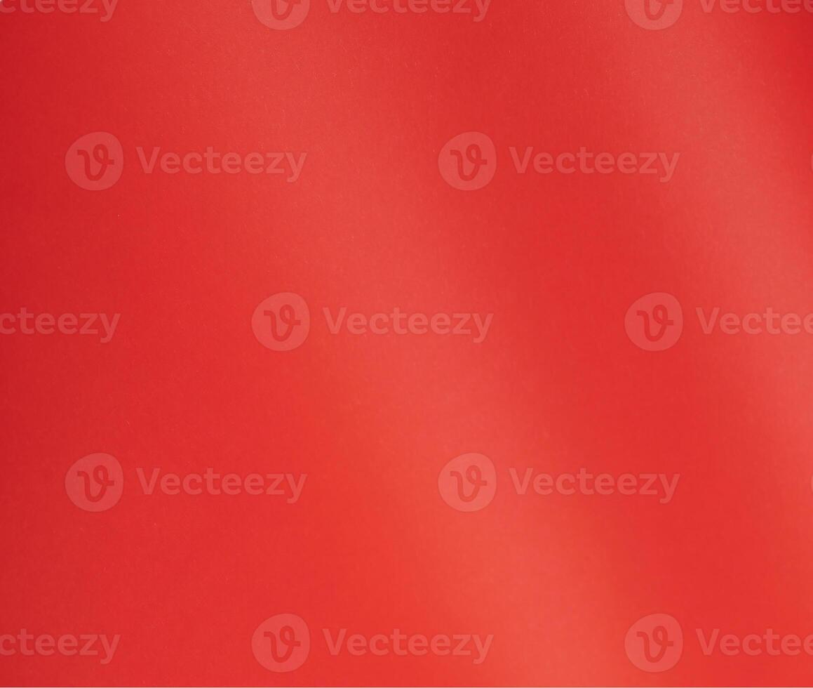 Scarlet red paper background with a smooth gradient and fine texture. Rich and vibrant color adds a photo