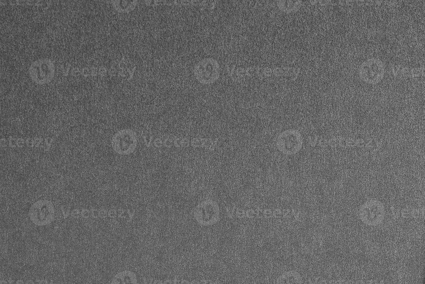 Gray paper texture with a robust, matte finish and a soft sheen. The industrial-inspired design photo