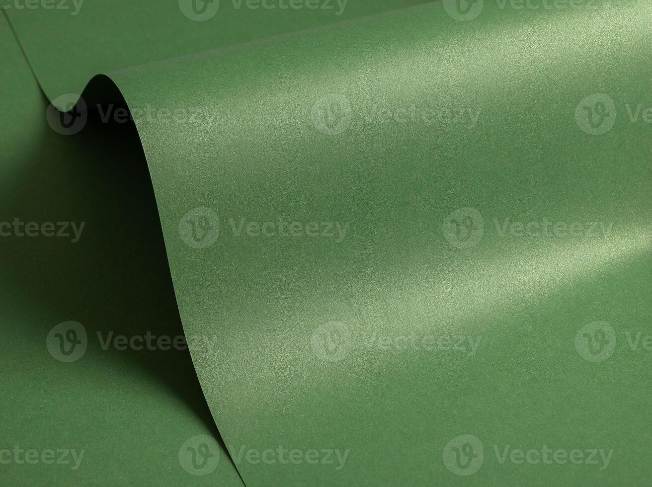 Luxurious green paper background with an emerald gradient and glossy metallic sheen. Smooth and photo