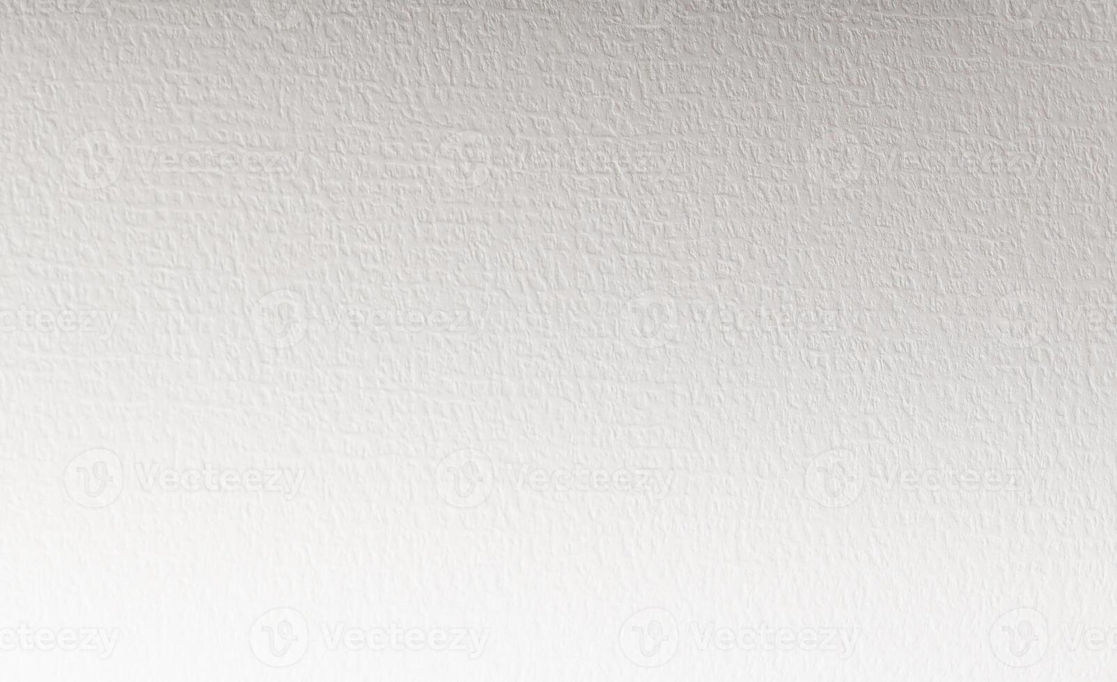 White paper background with a fine matte texture and subtle grain. The soft, neutral tones create a photo