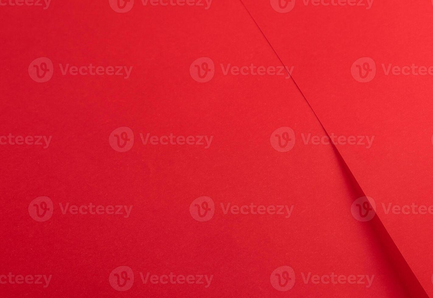 Luxurious red scarlet paper background with a smooth, vibrant texture and rich monochrome tones. photo