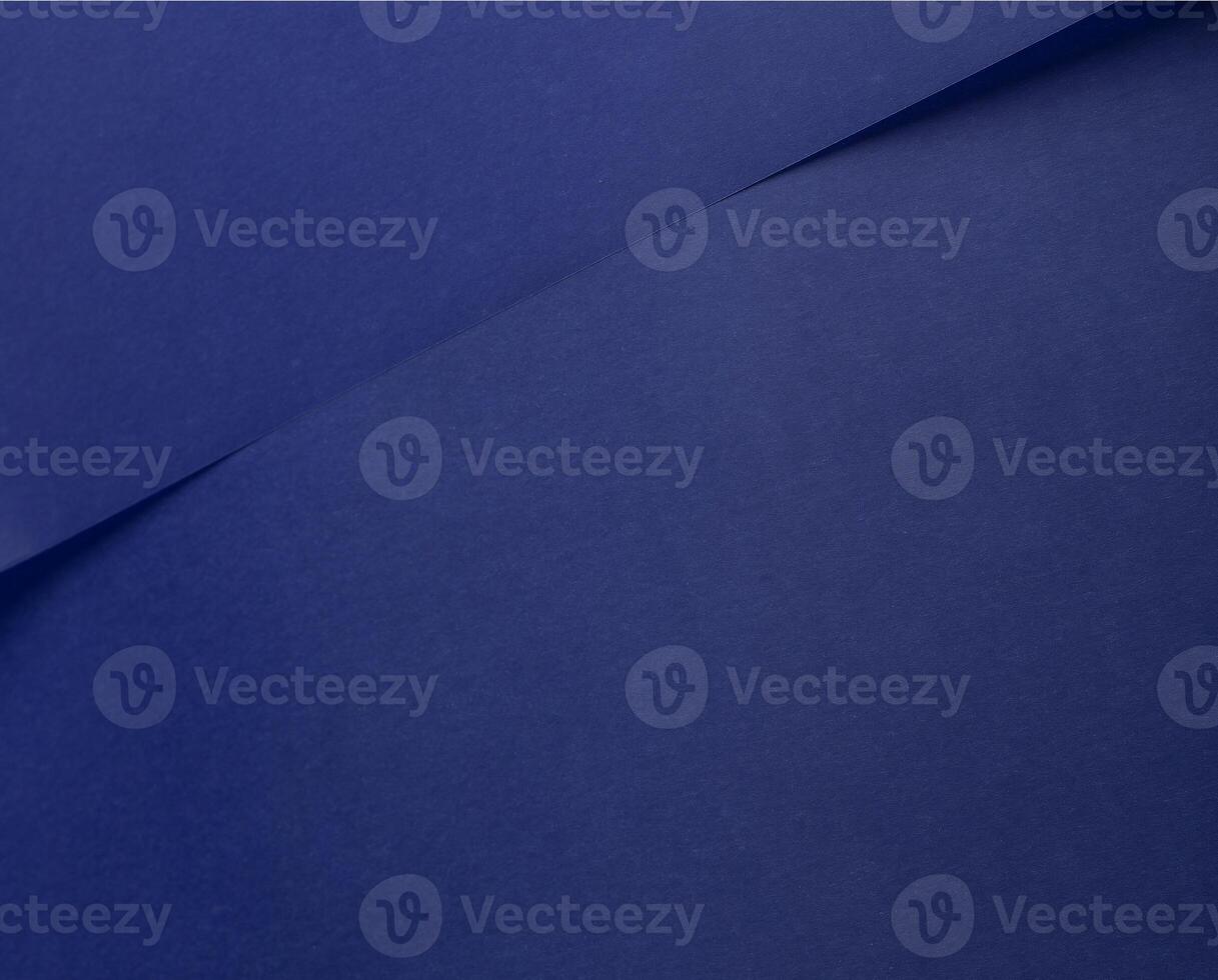 Elegant royal blue paper background with a matte finish and subtle gradient. Translucent texture photo