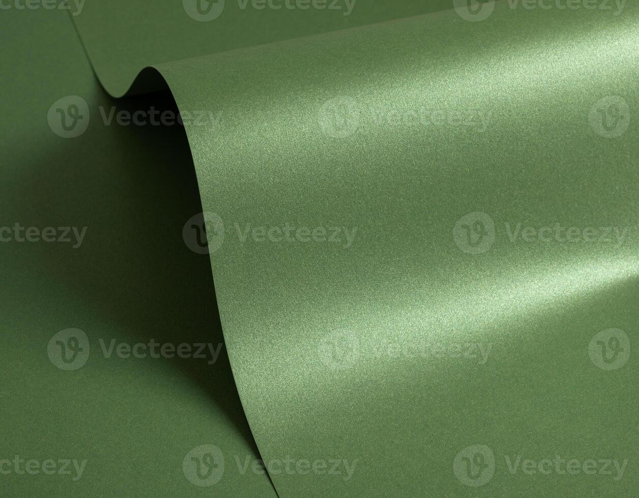 Luxurious green paper background with a soft satin texture and rich metallic sheen. Subtle gradient photo