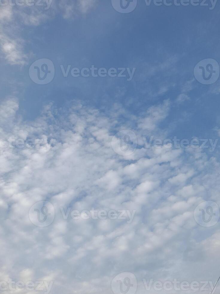 Blue sky background and white clouds photo
