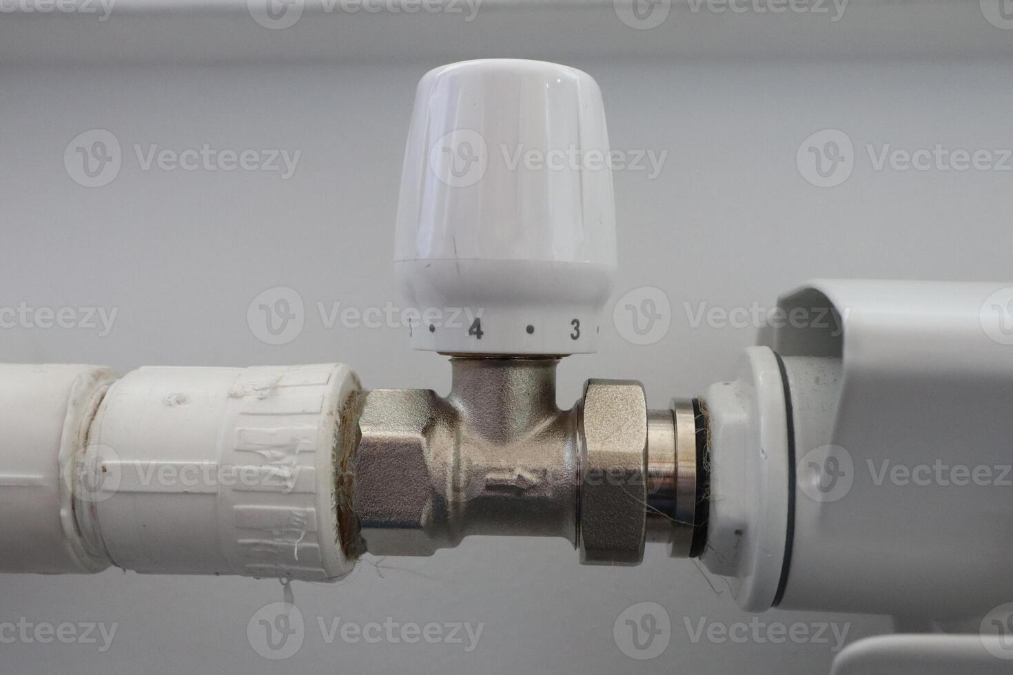 The thermostatic valve is essential for an effective radiator heating system in homes photo
