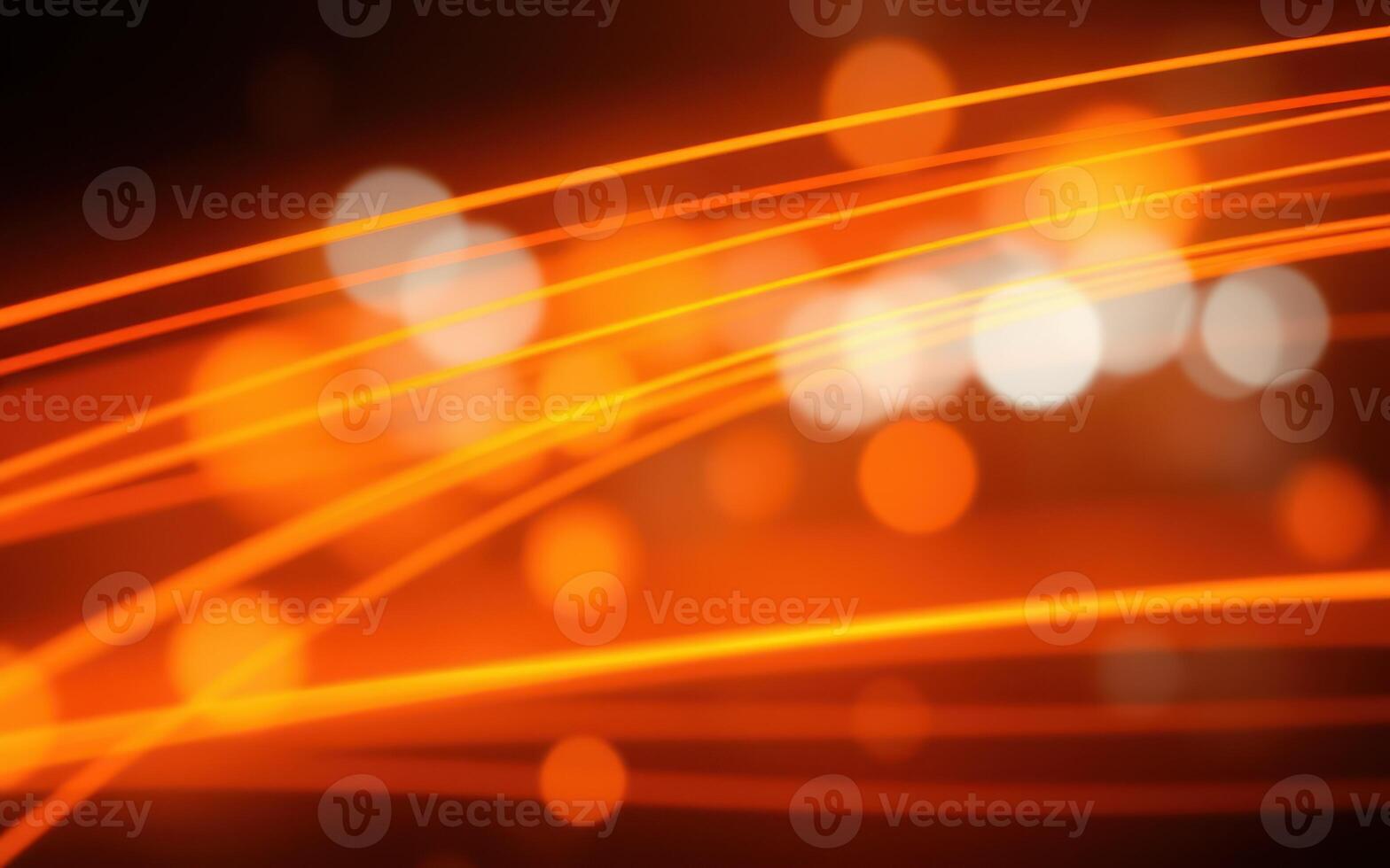 Vibrant orange and white light trails create an energetic atmosphere during a night event in a cityscape photo