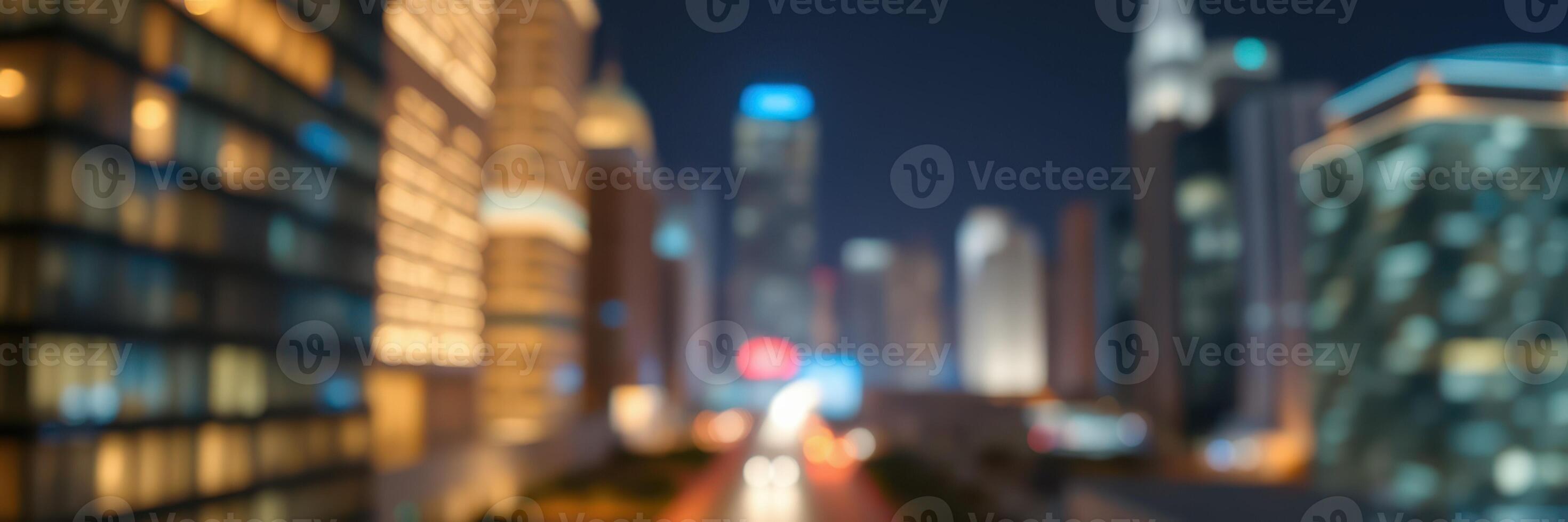City skyline illuminated at night with blurred lights and buildings creating a vibrant atmosphere photo