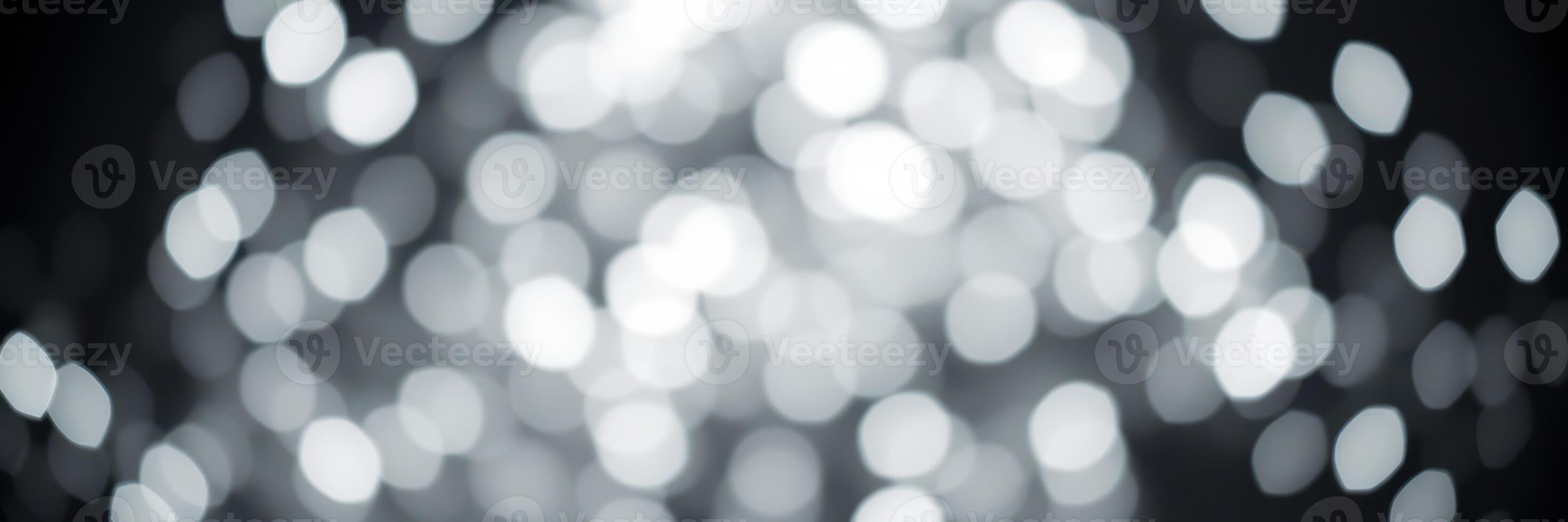 Elegant bokeh background creating a dreamy atmosphere with soft white lights at an evening event photo