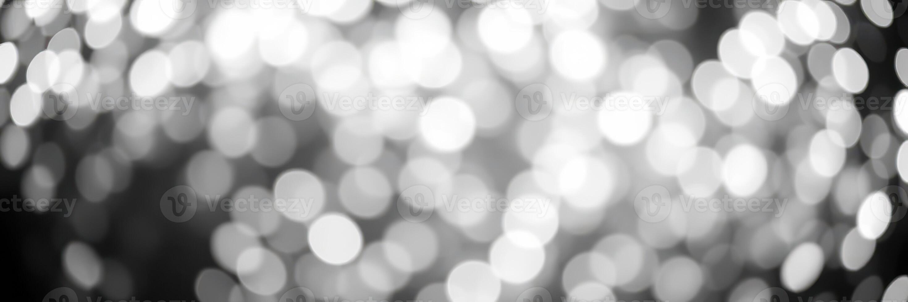 Shimmering bokeh lights create an enchanting atmosphere during a festive evening celebration photo