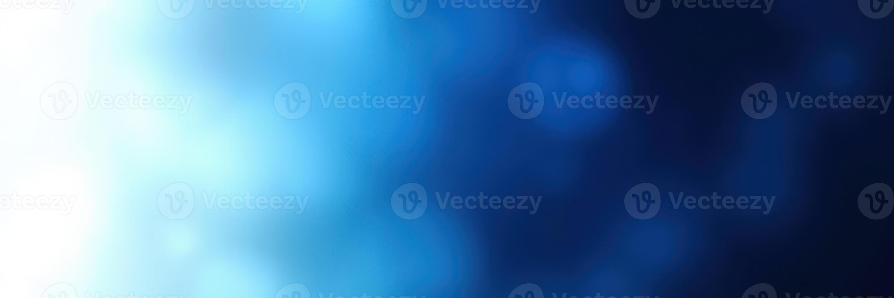 Abstract blue and light background with soft gradients and blurred textures creating a calm atmosphere photo