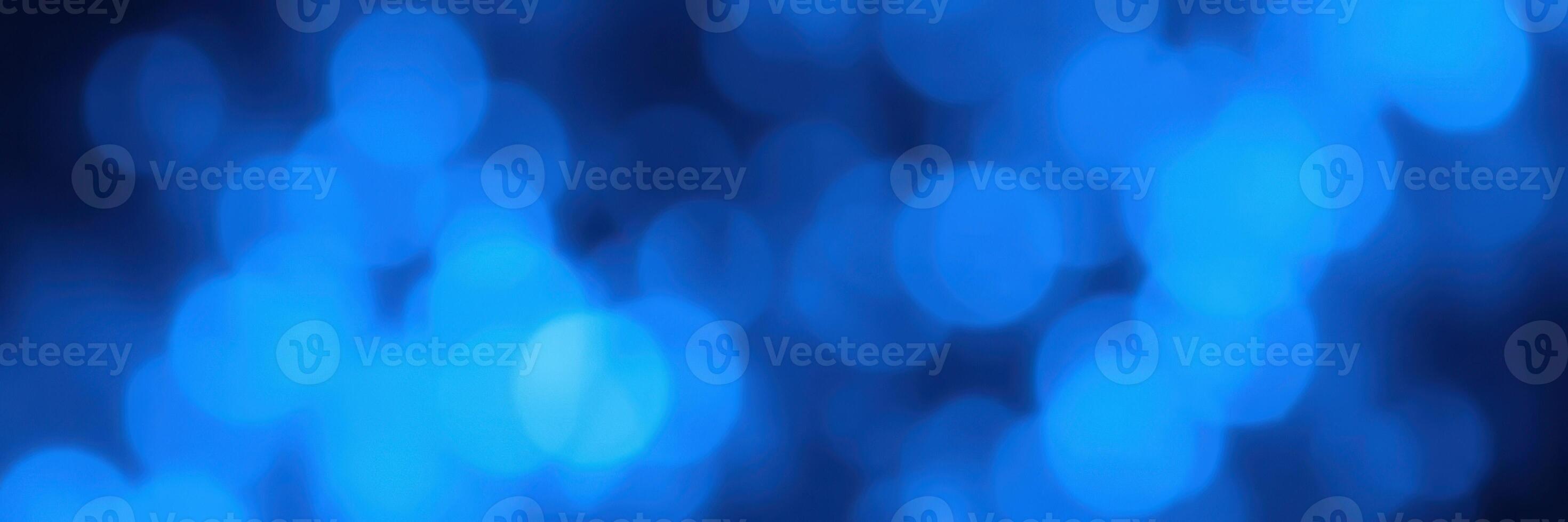 Abstract blue bokeh background with soft circular shapes creating a calming atmosphere for design purposes photo