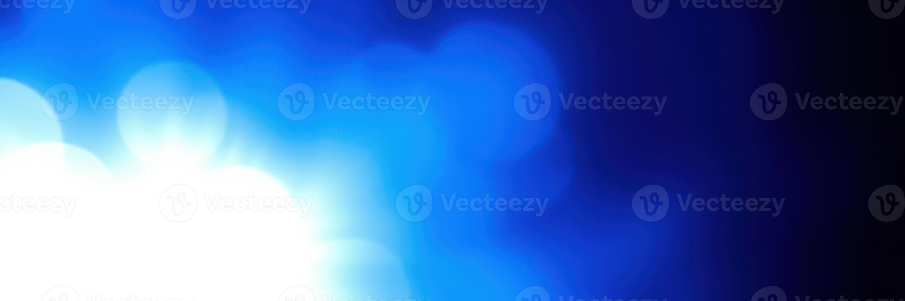 Soft blue light creates a calming atmosphere in a dimly lit space photo