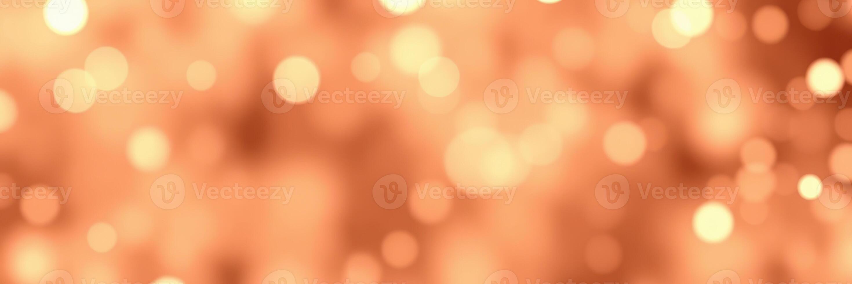 Golden bokeh lights create a warm atmosphere at an evening gathering photo