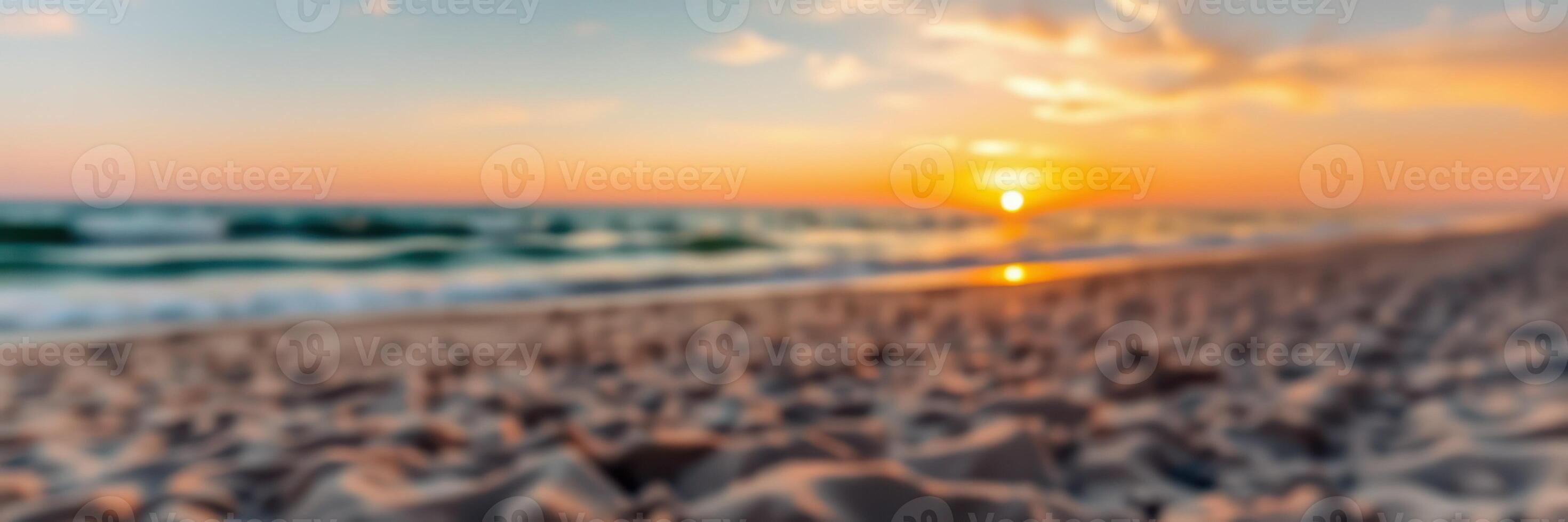 Sunset over the beach creates a serene atmosphere with soft waves and golden sand during the evening hours at the shoreline photo