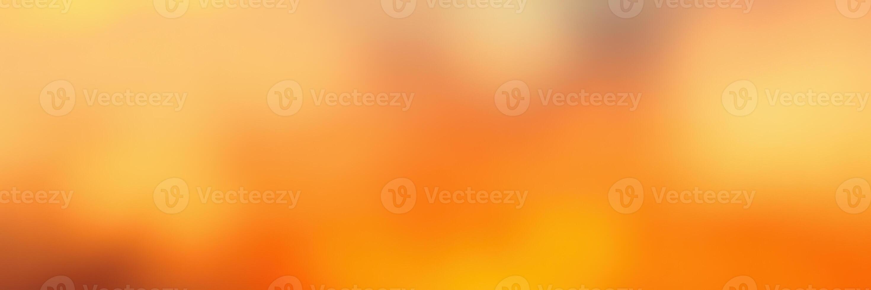 Vibrant sunset view over a calm lake reflecting warm hues of orange and yellow during evening hours in a tranquil setting photo