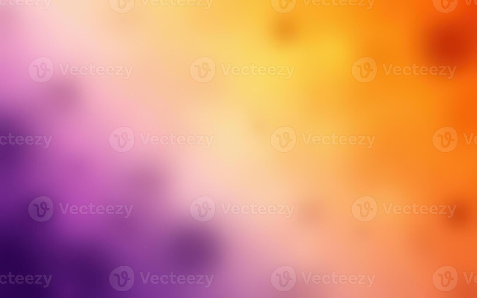 Colorful abstract background blending orange, purple, and yellow shades for a vibrant artistic effect photo
