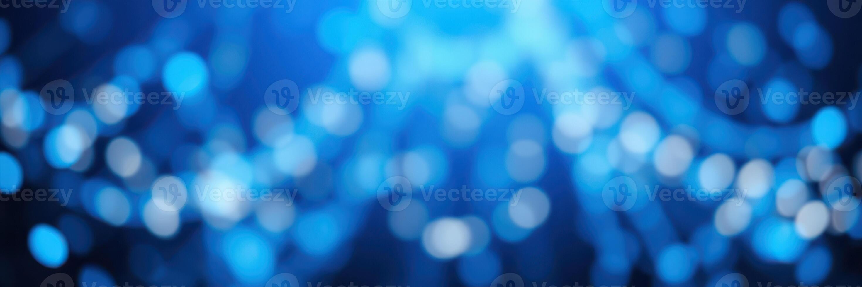 Beautiful blue bokeh effect creating a dreamy atmosphere at a nighttime event photo