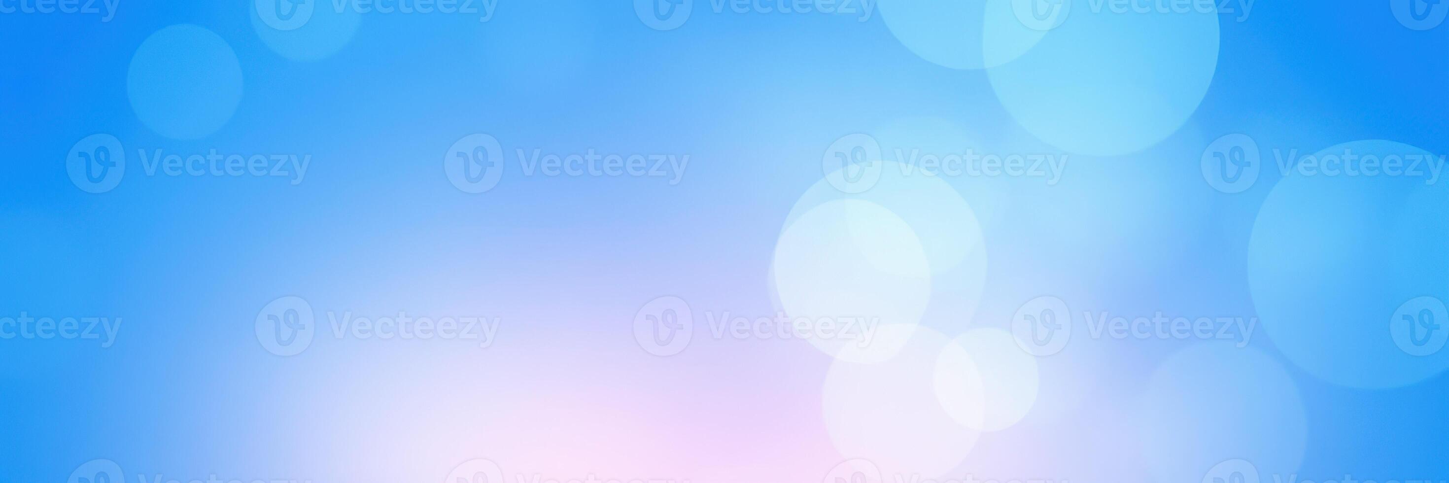 Abstract blue background with soft bokeh lights creating a calming atmosphere perfect for digital designs photo
