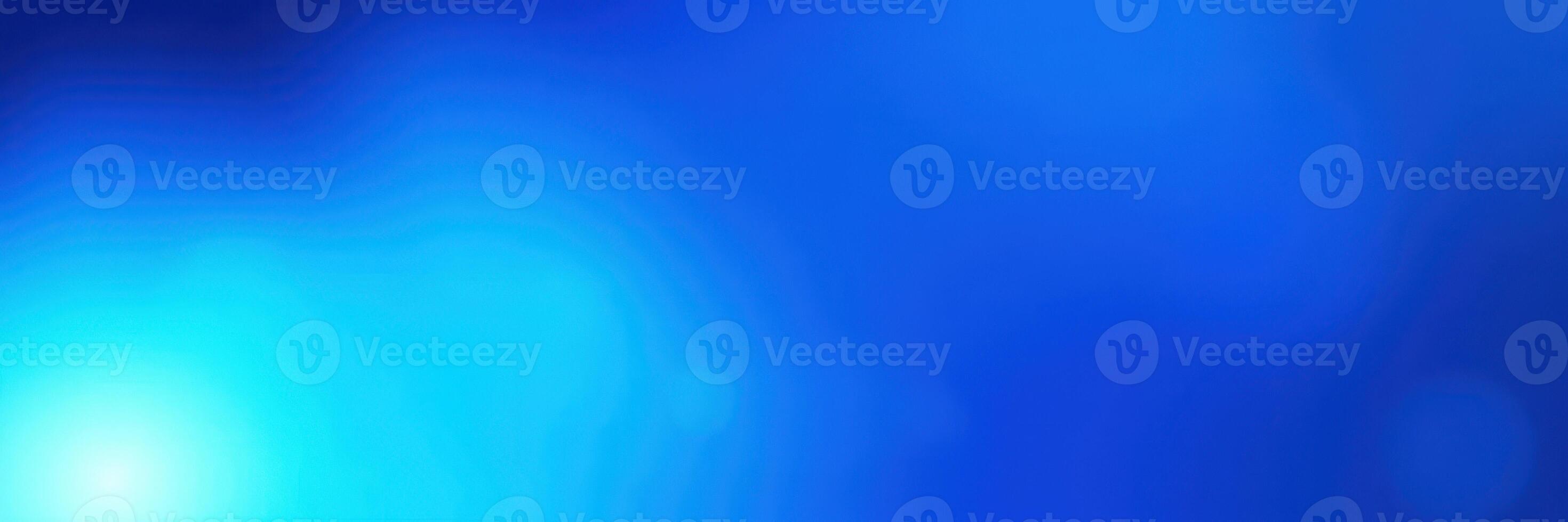 Vibrant blue abstract background creates a serene and calming atmosphere for design photo