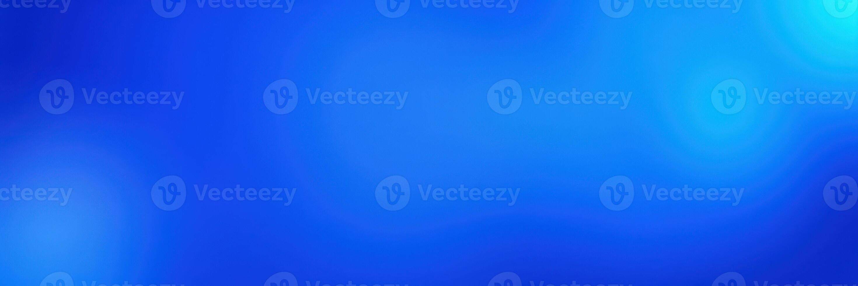 Vibrant blue abstract background with smooth gradients and flowing shapes evoking tranquility and creativity photo