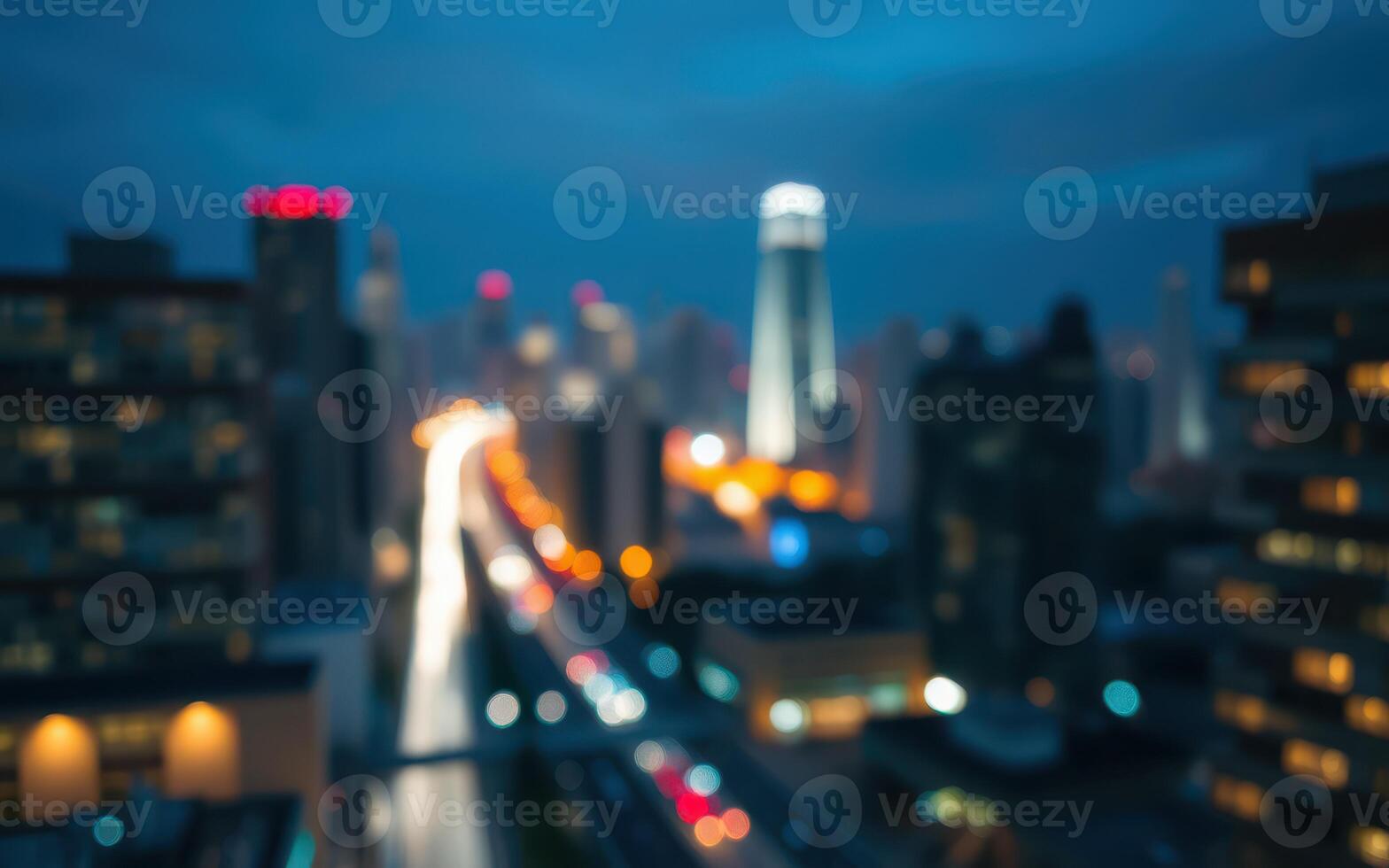 Urban skyline at dusk with blurred city lights and traffic on a busy street photo