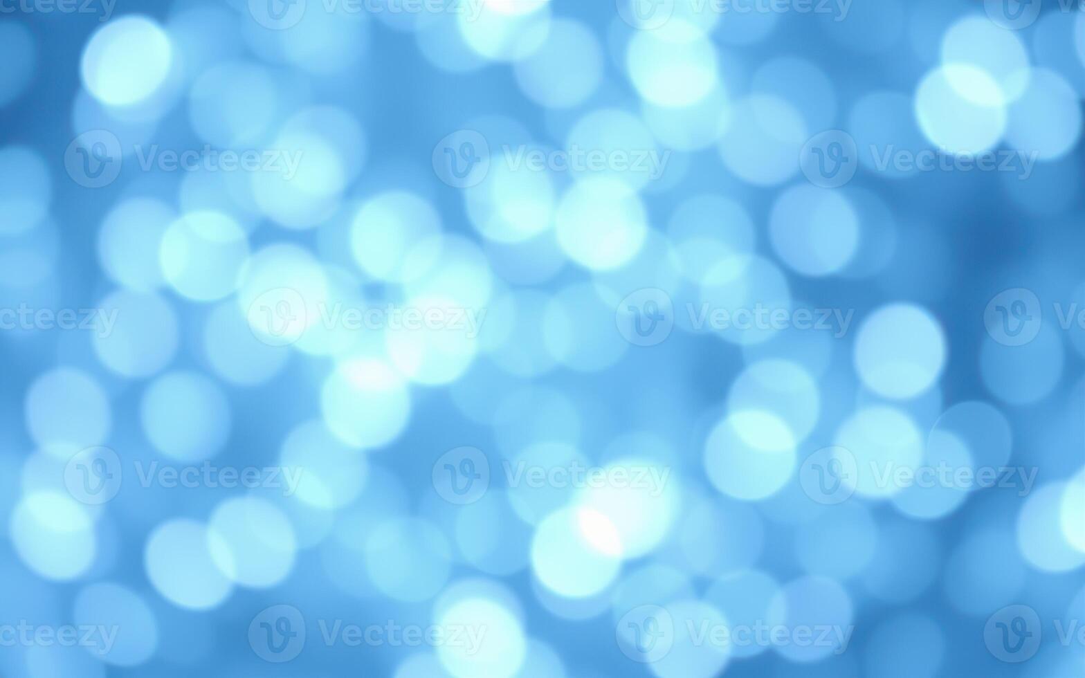 Stunning blue bokeh background with a mix of soft circles creating a tranquil atmosphere photo