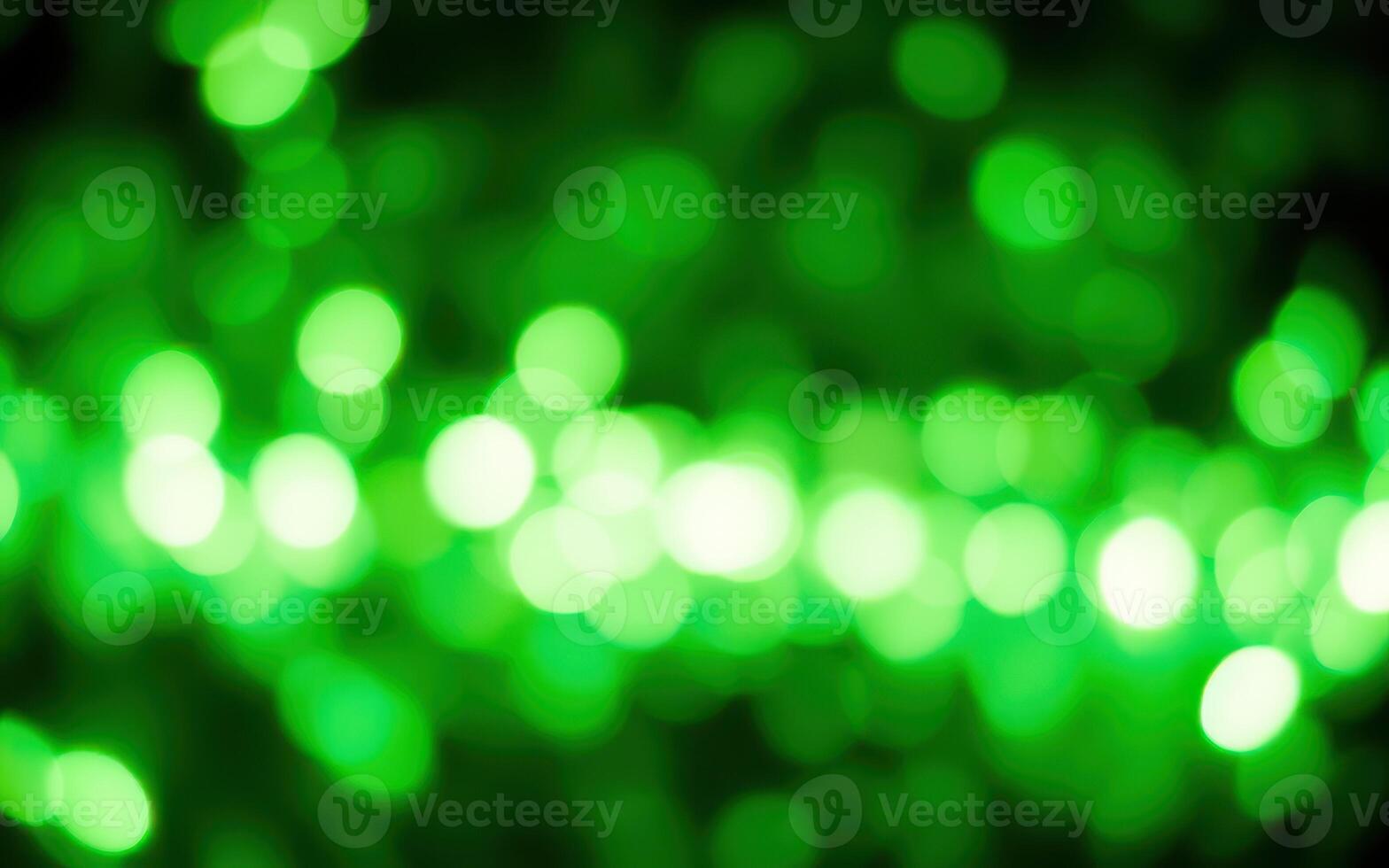 Colorful green bokeh lights create a vibrant atmosphere during a festive evening celebration of nature photo
