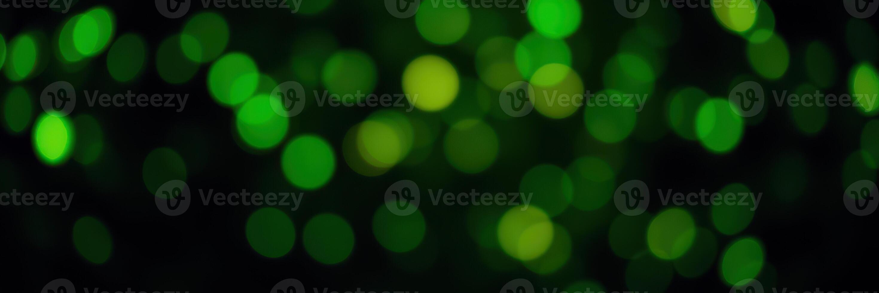 Vibrant green bokeh lights create a magical atmosphere in a festive celebration at night photo