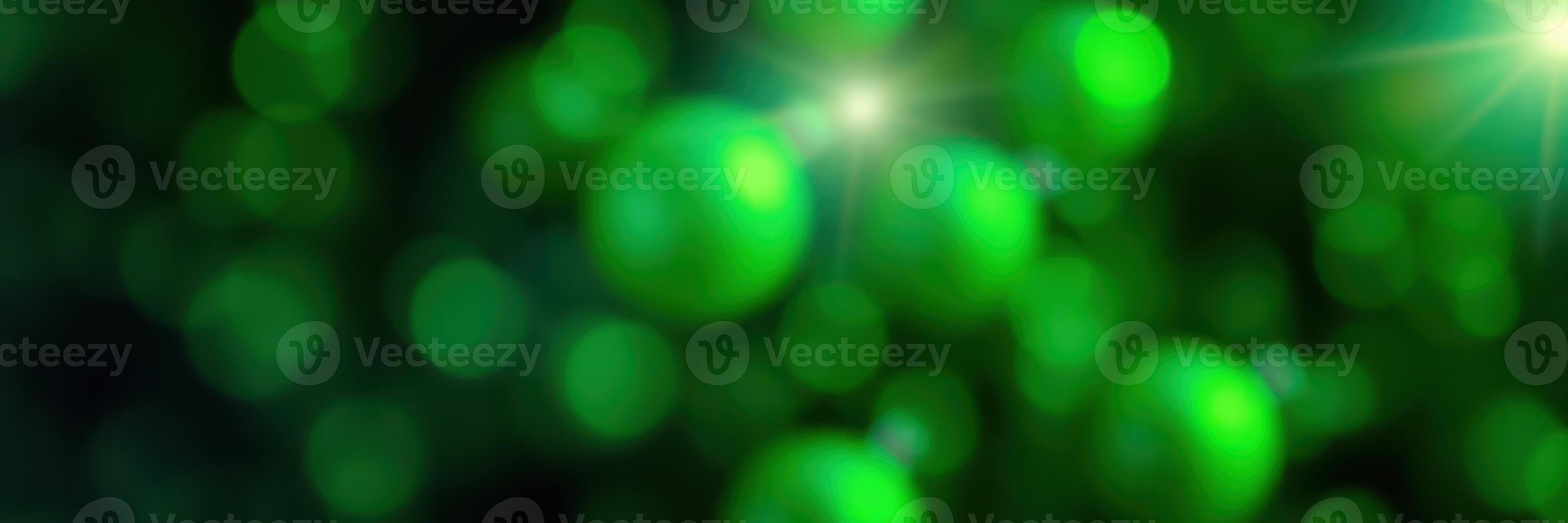 Soft green bokeh background creating a tranquil atmosphere ideal for designs and art projects focused on nature themes photo