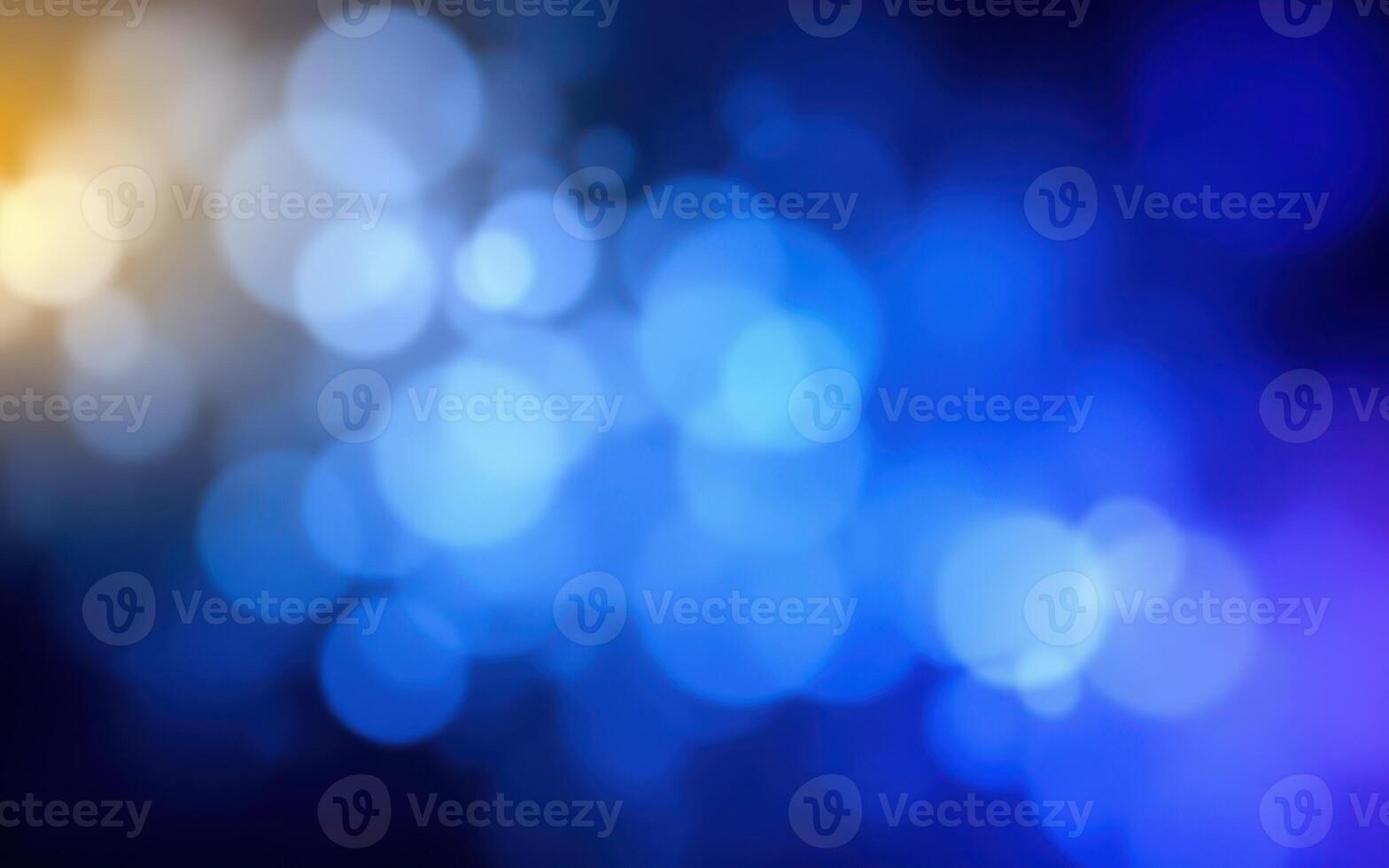 Colorful abstract bokeh background creates a vibrant visual experience with blue hues and warm accents photo
