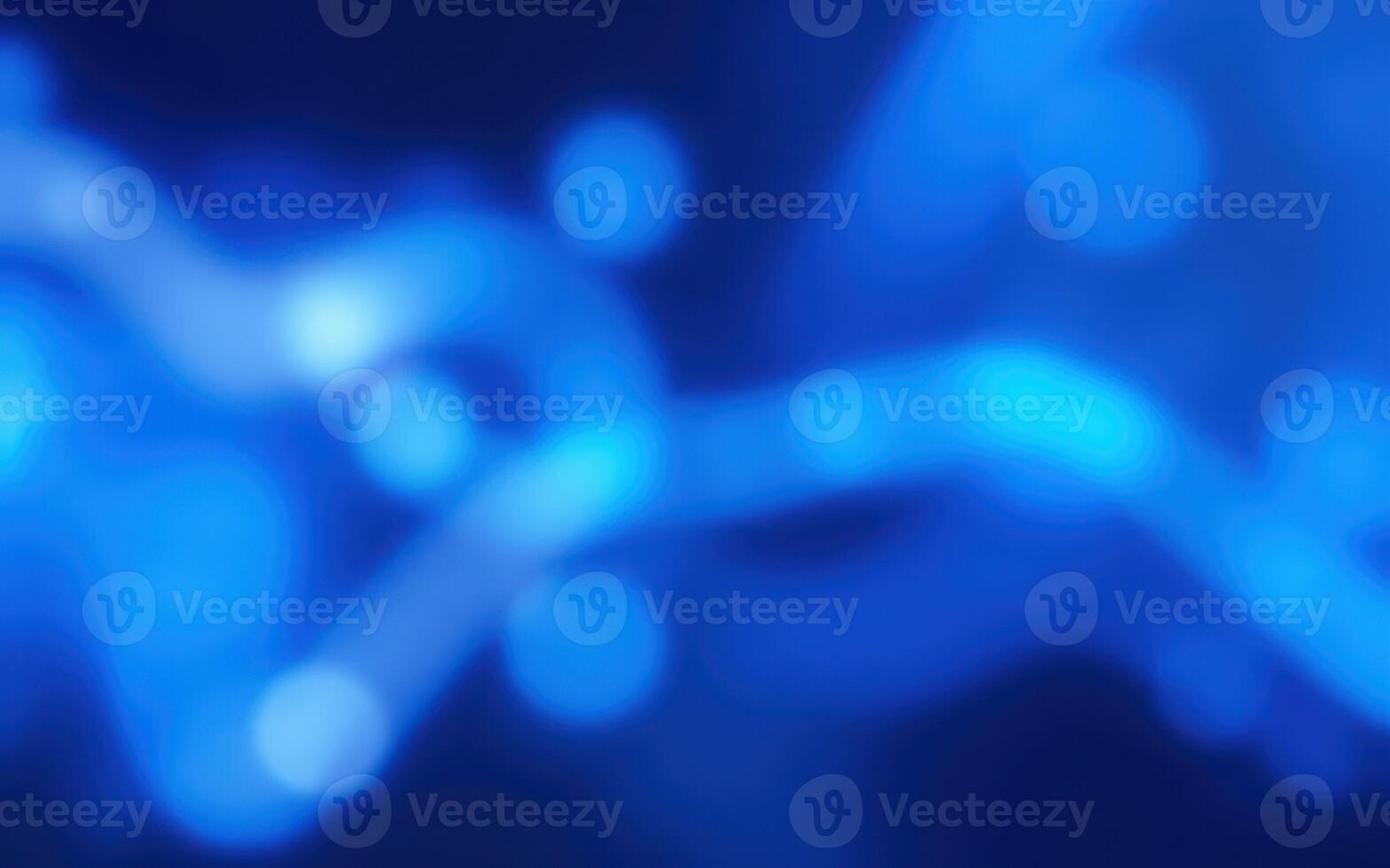 Dynamic blue abstract glow reveals intricate patterns in a digital landscape created through advanced visual technology photo