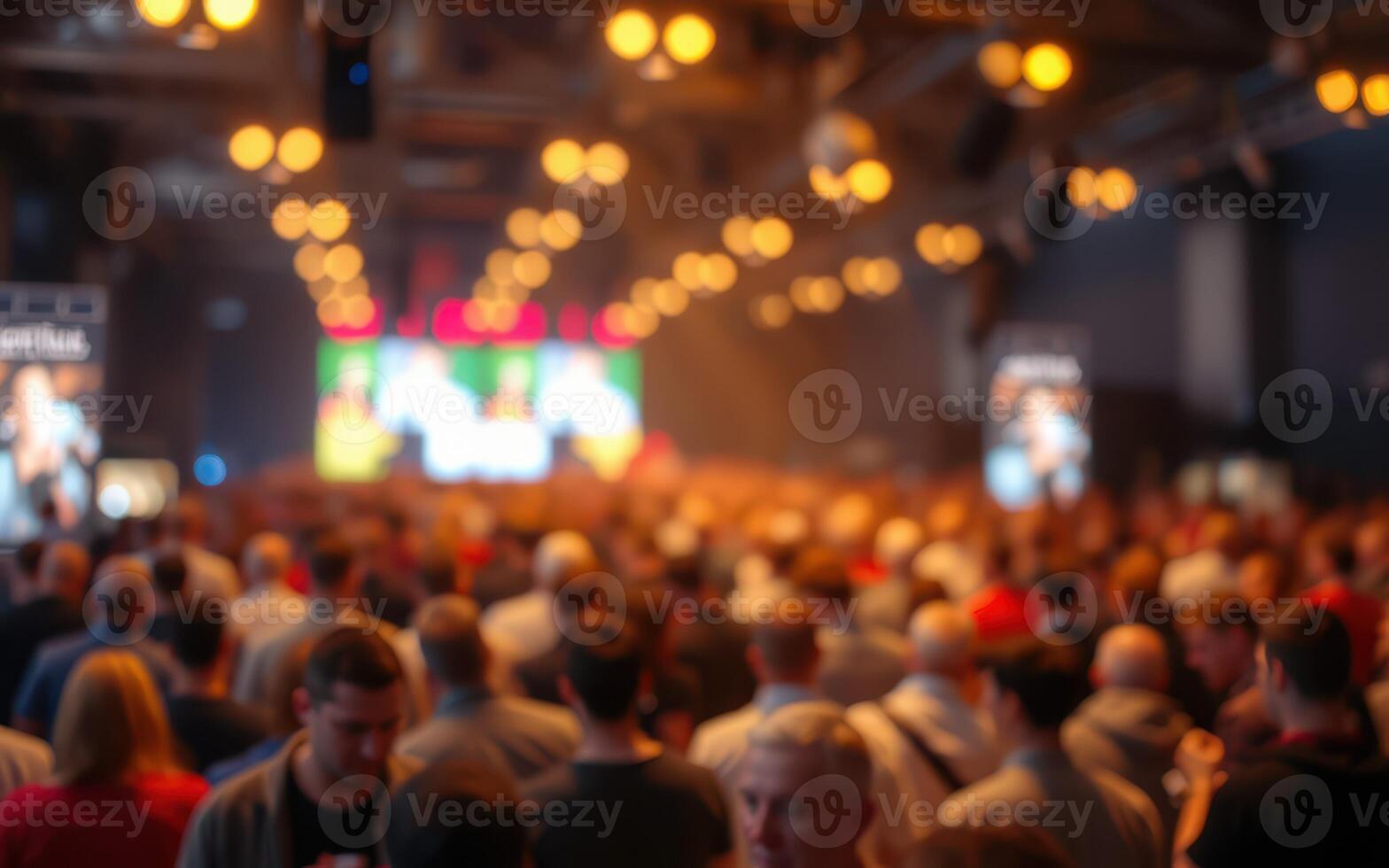 Crowd gathers at lively event in a bustling venue featuring bright lights and a vibrant atmosphere photo